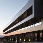 Edificio de oficinas y nave de producción para Power Electronics / Idom