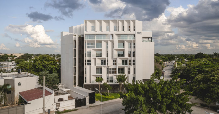 Edificio de viviendas Ment / Arkham Projects + Desnivel Arquitectos